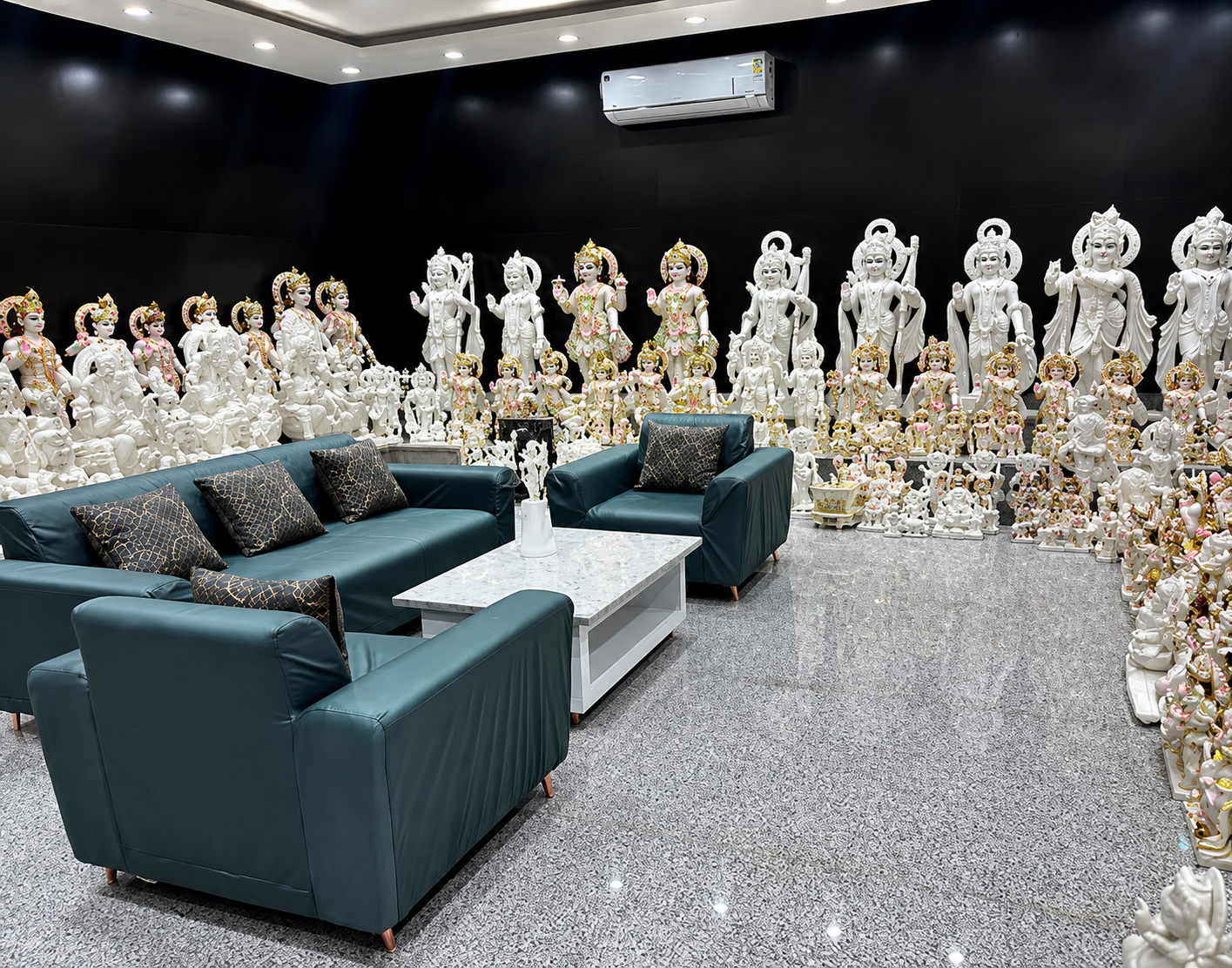 Master carvers hand-carving marble idols in Jaipur workshop